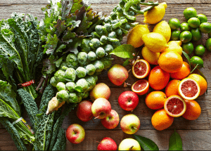 a group of fruits and vegetables on a wood surface Healthy Weight Loss Diets Beeston Hill